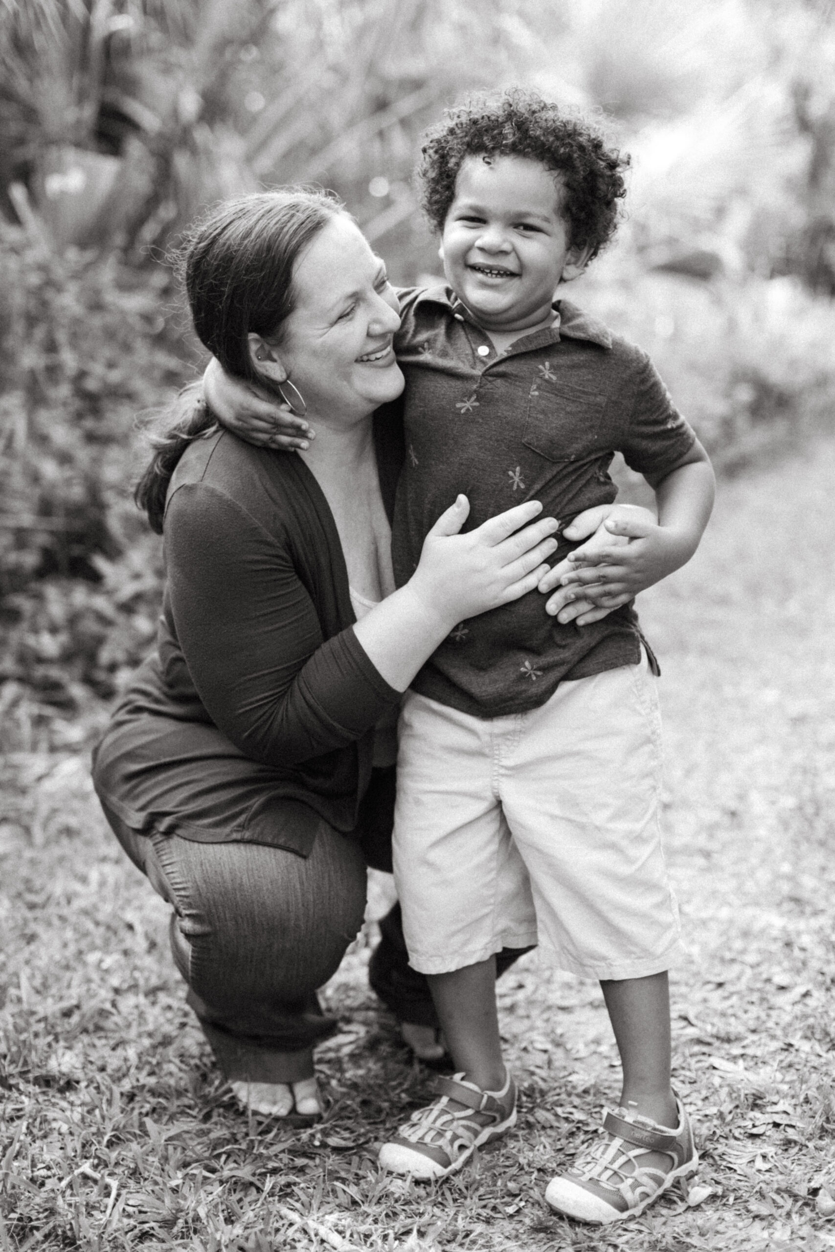 Motherhood and Family Photographer Lauren Neal Photography Mother holds her son in Venice, Florida