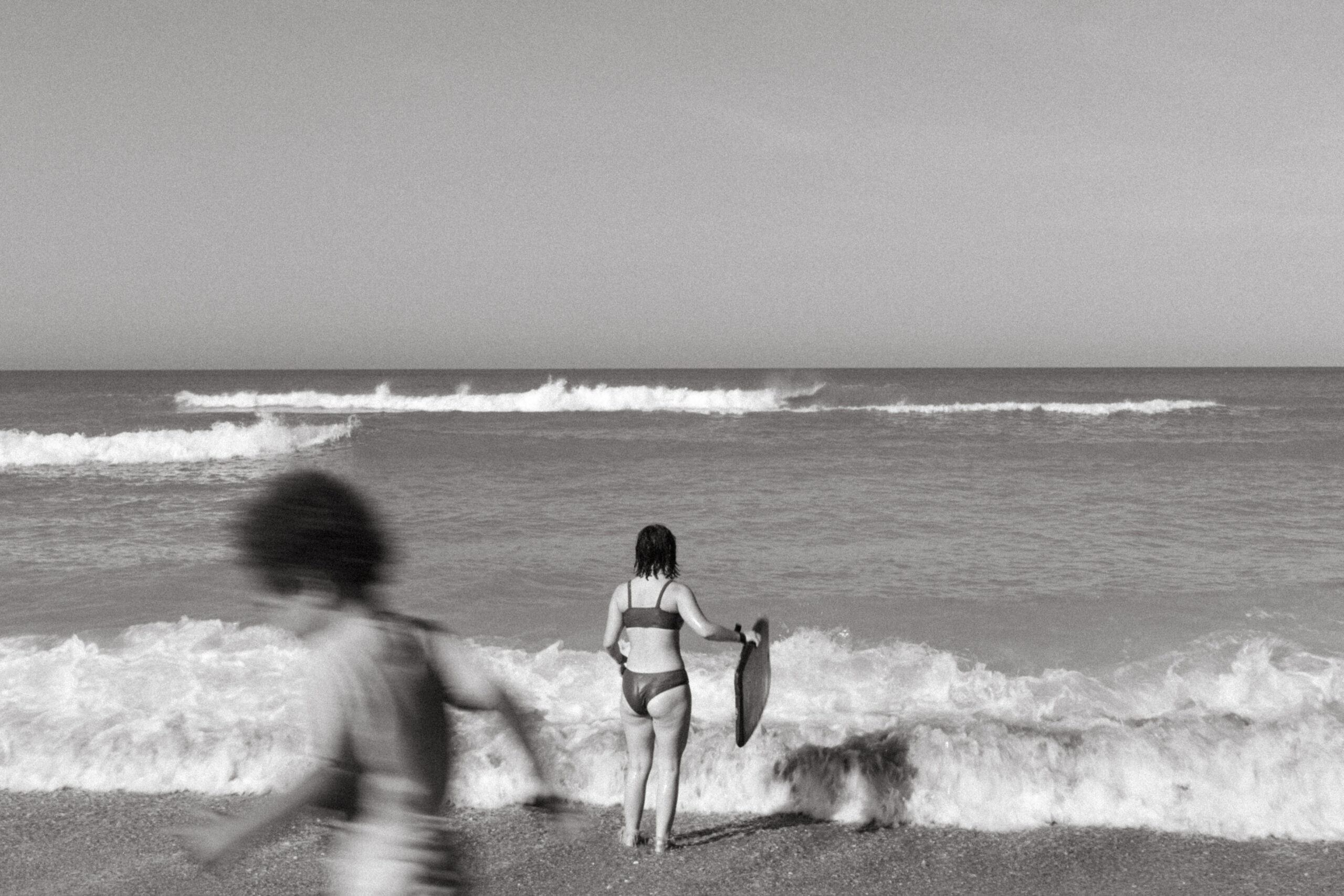 Two children play on the beach in Venice, Florida