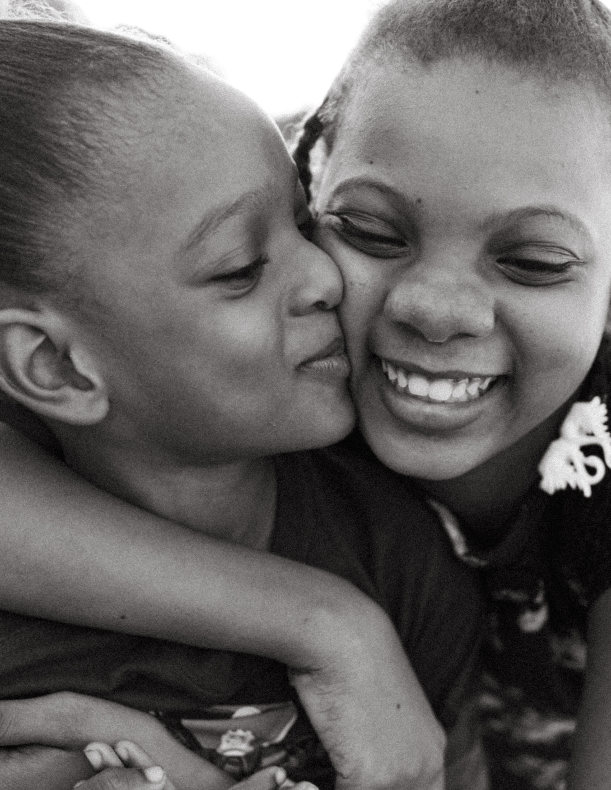 Two Haitian children embrace in Port-au-Prince, Haiti