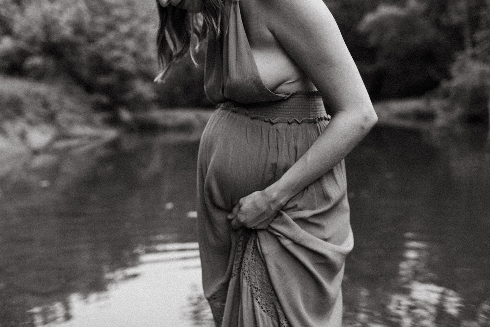 Pregnant woman walks in the water in Cincinnati, Ohio