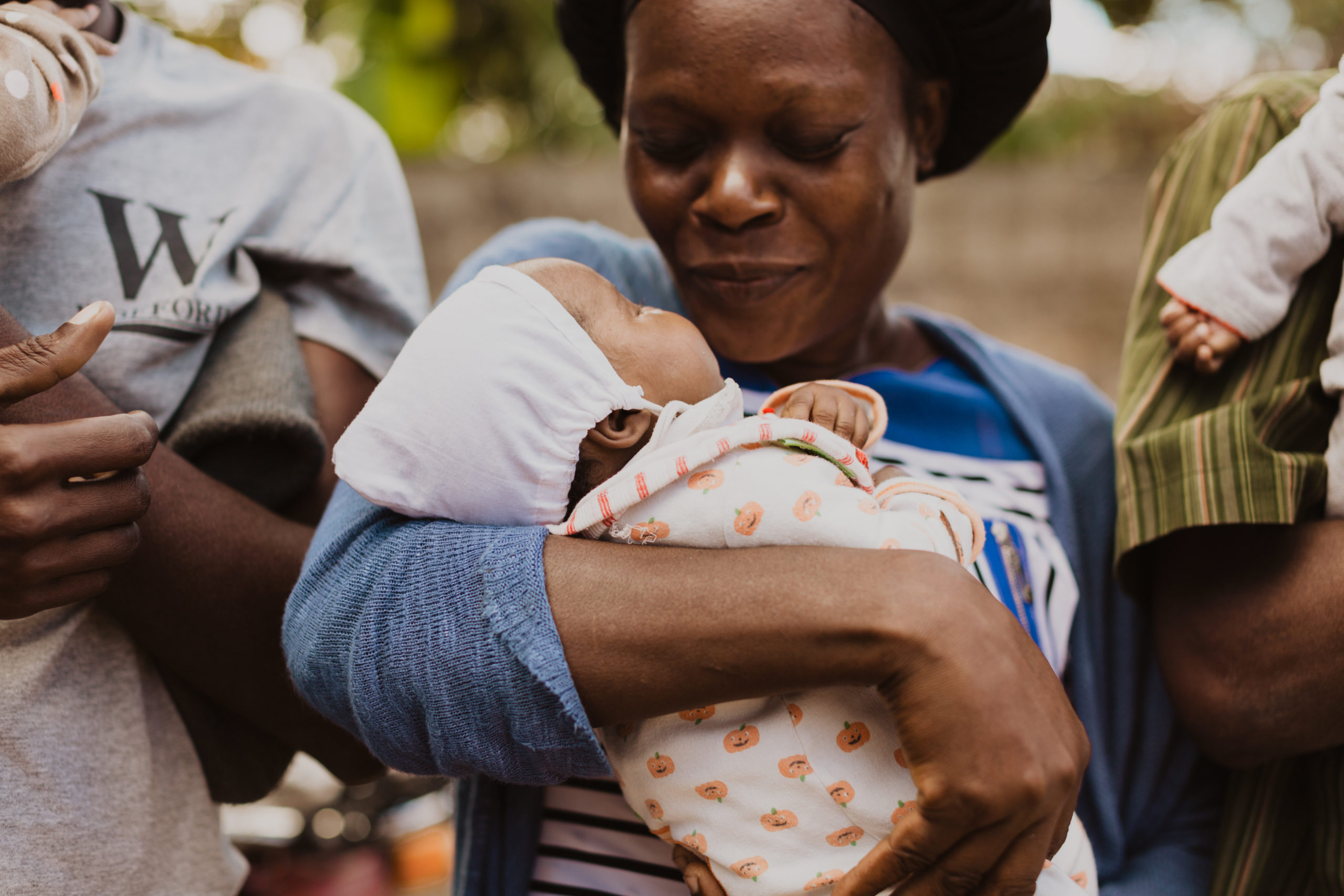 Haiti Humanitarian Photographer Lauren Neal Photography Humanitarian photographer photographs mother and child in Haiti
