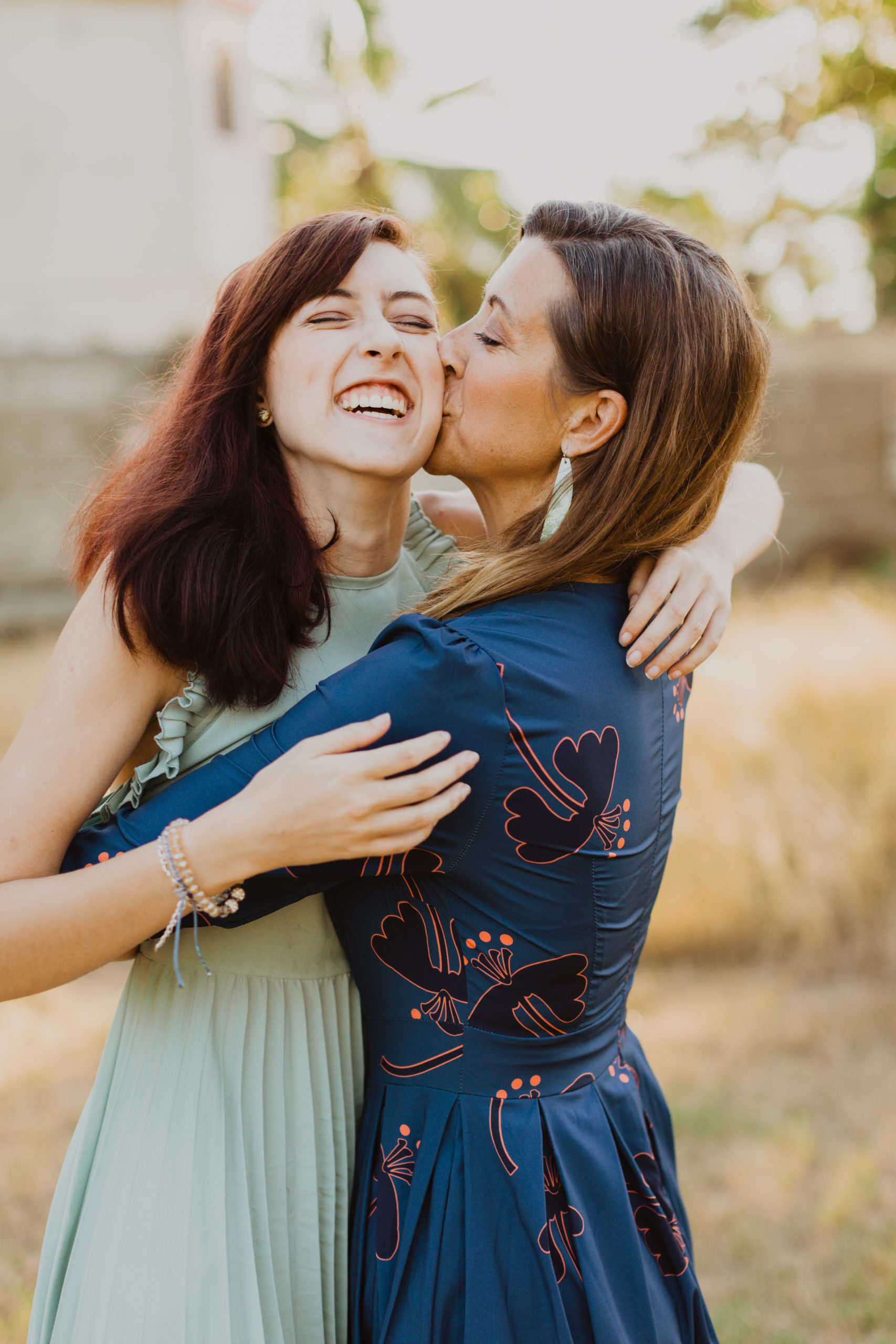 Expat Family Photographer Lauren Neal Photography Mother and daughter embrace for a hug in Haiti