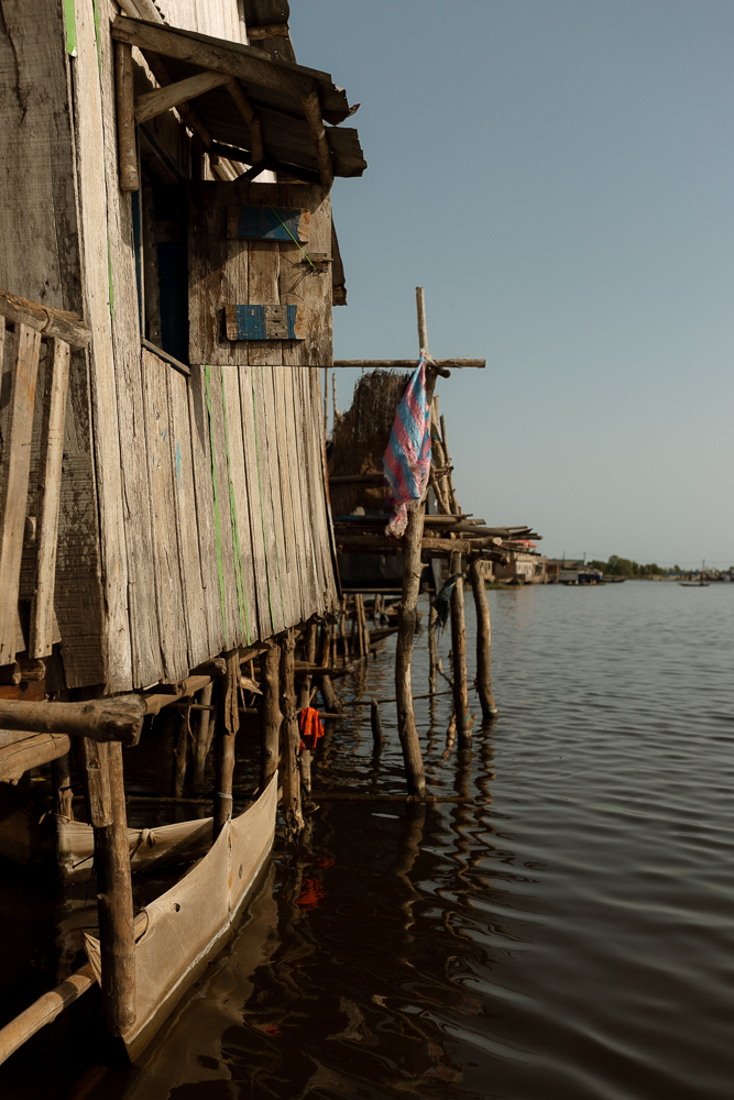 ganvie-benin-fishing-village-38 Clothes hang to dry on a clotheslines in the yard of a migrant home in Acuña, Mexico